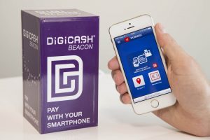 A mobile phone using a Digicash beacon to make a payment