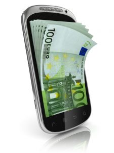 A mobile phone with money on it